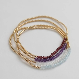 Handmade amethyst and garnet beaded bracelets set with gold accents for women