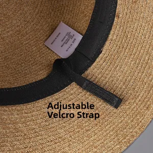 Detail view of straw hat inner band with Velcro strap for head size adjustment