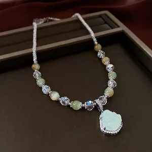 Zircon Buddha necklace with light green beads and clear crystal stones for women