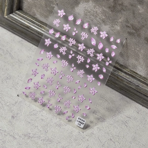 3D embossed cherry blossom nail stickers with floral patterns and adhesive backing
