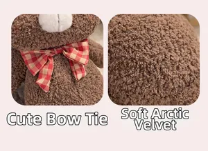 Detail of soft polar fleece fabric and classic red plaid bow on the brown teddy bear doll