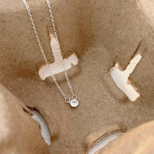 Minimalist 925 sterling silver necklace featuring a round zircon solitaire on a fine chain