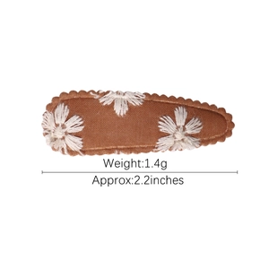 Brown floral fabric hair clip with white daisy embroidery for girls, 2.2 inches long