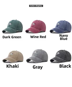 Color display of washed cotton baseball caps with embroidered dog design in six colors