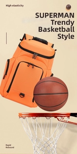 Detail of bright orange sports backpack with multiple zippered compartments and sturdy handle
