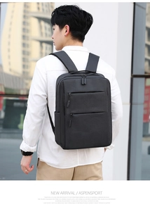 Close-up of padded breathable shoulder straps on a black business laptop backpack