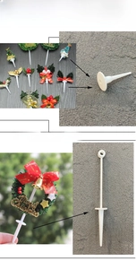 Detailed view of Christmas cake topper bases with festive trees and ribbon decorations
