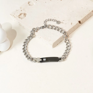 Chunky stainless steel cross bracelet with black zircon bar and silver curb chain