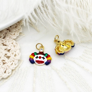 Colorful enamel clown pendant with sparkling crystal loop and golden metal finish
