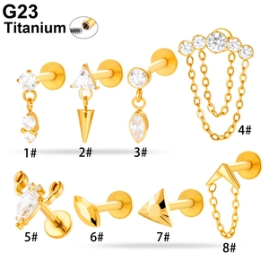 G23 titanium gold piercing studs featuring chains and zircon inlays for cartilage and lips