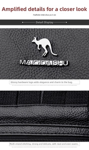 Detailed macro view of litchi texture leather with silver kangaroo logo and precision stitching