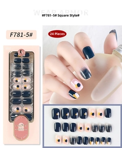 Short square press-on nails with blue and pink wave patterns and silver glitter detail