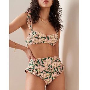 Two-piece floral bikini set with high-waisted ruffled bottoms and underwire top
