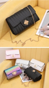 Detail shot of woven texture and gold chain strap on small gradient shoulder bags
