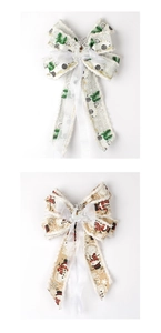 Detail of Christmas fabric bows with Merry Christmas prints and silver deer charms