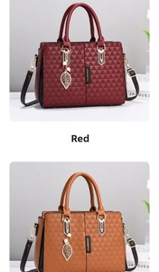 Detail of embossed tote bags in burgundy and caramel with gold hardware and leaf pendant