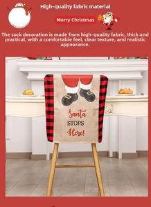 Close-up of Santa chimney chair cover with burlap texture and festive grid pattern