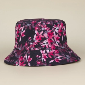 Detailed close-up of a black floral bucket hat with pink and purple tropical plant prints