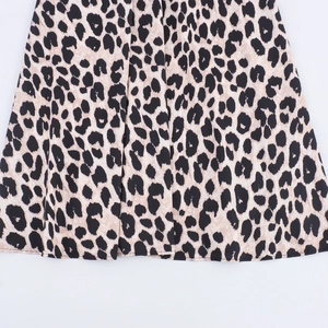 French vintage leopard print maxi dress featuring elegant pleated waist and beige patterns