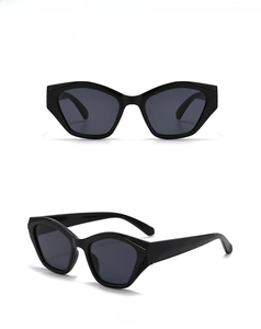 Front and 45-degree side view of modern retro cat-eye sunglasses with textured temples