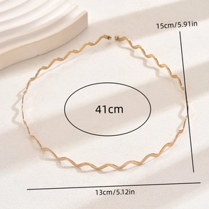 Detailed dimensions of the gold wavy metal headband shown with its measurements