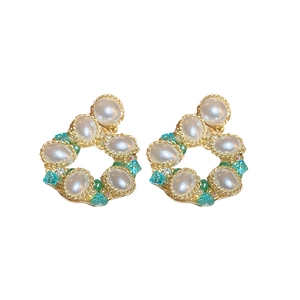 Baroque floral earrings with pearls, green crystals, and blue gems in gold setting