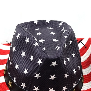 Detailed top view of American flag cowboy hat with white stars and metallic star studs