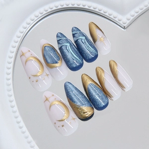 Blue cat-eye press-on nails with 3D gold stars and moon details on heart mirror