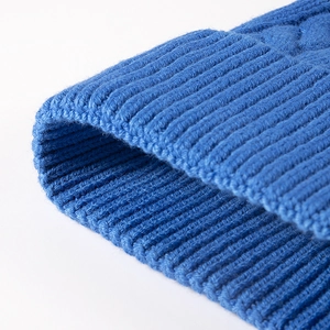 Royal blue tie-dye knit beanie featuring premium rib stitch and cable pattern texture