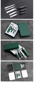 Detailed macro view of high-grade stainless steel manicure tools in a green storage case