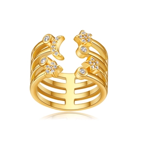 Macro detail of luxury gold bow and star-moon zircon ring with multi-layer open band