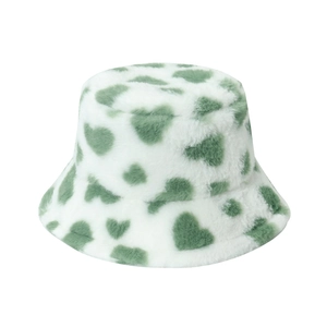Winter plush faux rabbit fur bucket hat with green heart patterns on white fabric