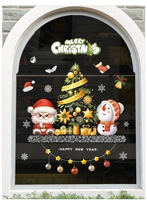 Festive Christmas window stickers with Santa Claus, snowmen and decorated holiday trees