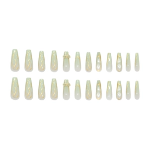 Mint green coffin press-on nails with daisy patterns and 3D gold bow accessories