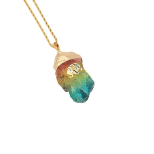 Natural crystal stone necklace with gold elephant pendant on a stainless steel chain