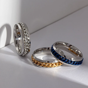 Three-color 6mm spinner chain rings in silver gold and blue polished stainless steel