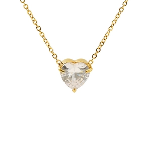 Detail of gold heart pendant necklace featuring a clear claw-set cubic zirconia stone
