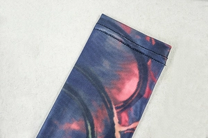 Detail of high-density lockstitch sewing and digital print on stretch knit fabric