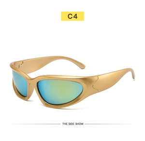 Side view of futuristic Y2K cycling sunglasses with golden frame and gradient lenses