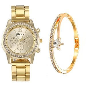 Dettaglio dell'orologio al quarzo dorato di lusso con strass e bracciale a stella