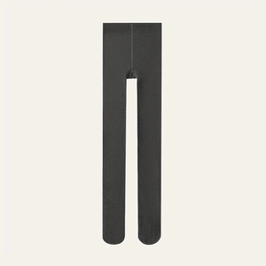 Detailed close-up of dark black thermal leggings with micro-knit texture and high waist