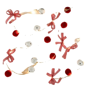 Christmas LED fairy lights with red buffalo plaid bows, white stars, and bells