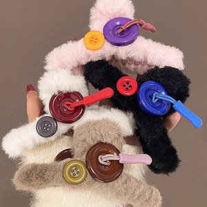Furry plush claw clips with button accents in various colors for women's hair styling