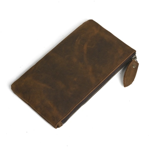 Minimalist brown crazy horse leather long wallet for men and women on white background