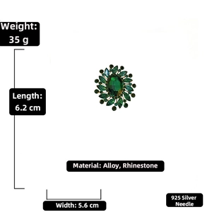 Detailed view of emerald crystal flower brooch dimensions 6.2cm by 5.6cm in gold tone