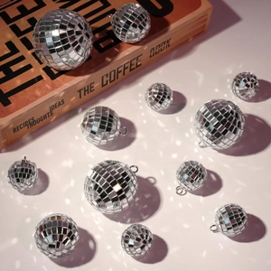 Silver mirror disco ball ornaments in various sizes for Christmas tree decoration