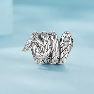 S925 sterling silver coiled snake charm with green zircon eyes and vintage oxidized finish