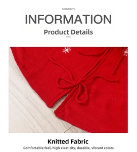 Détail du tapis de sapin de Noël tricoté rouge avec broderie flocon de neige blanche et lien