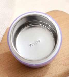 Detail shot of the SUS304 stainless steel interior stamp of the purple insulated cup