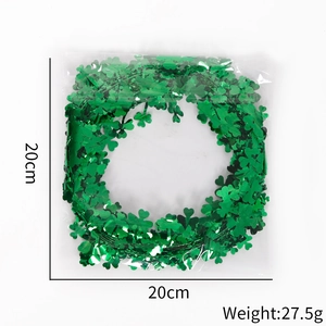 Detail of St. Patrick's Day green tinsel shamrock wreath with 20cm size measurement